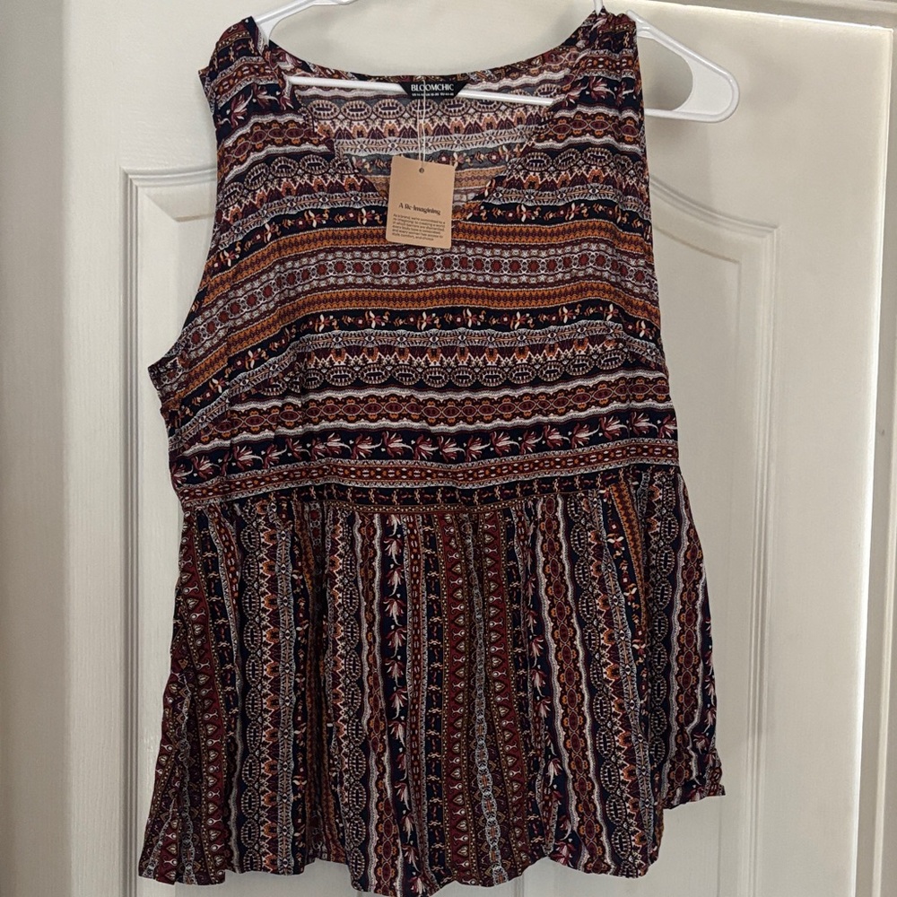 BloomChic Sleeveless Blouse with Rich Patterns